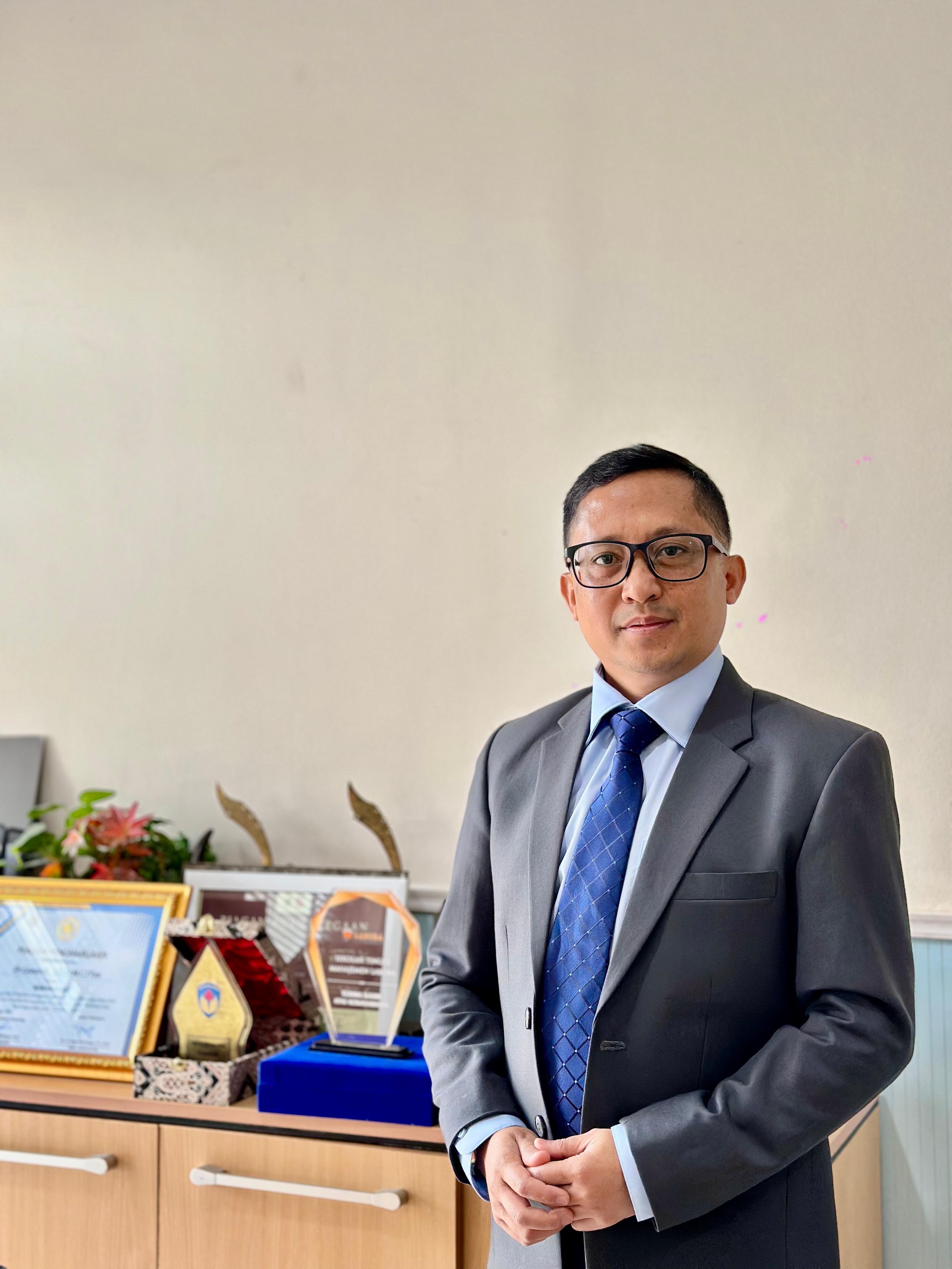 Dr. Gunardi, SE.,MM.,CFTAX